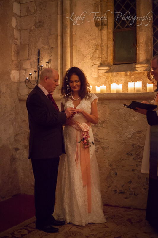 exchanging rings at chapel wedding